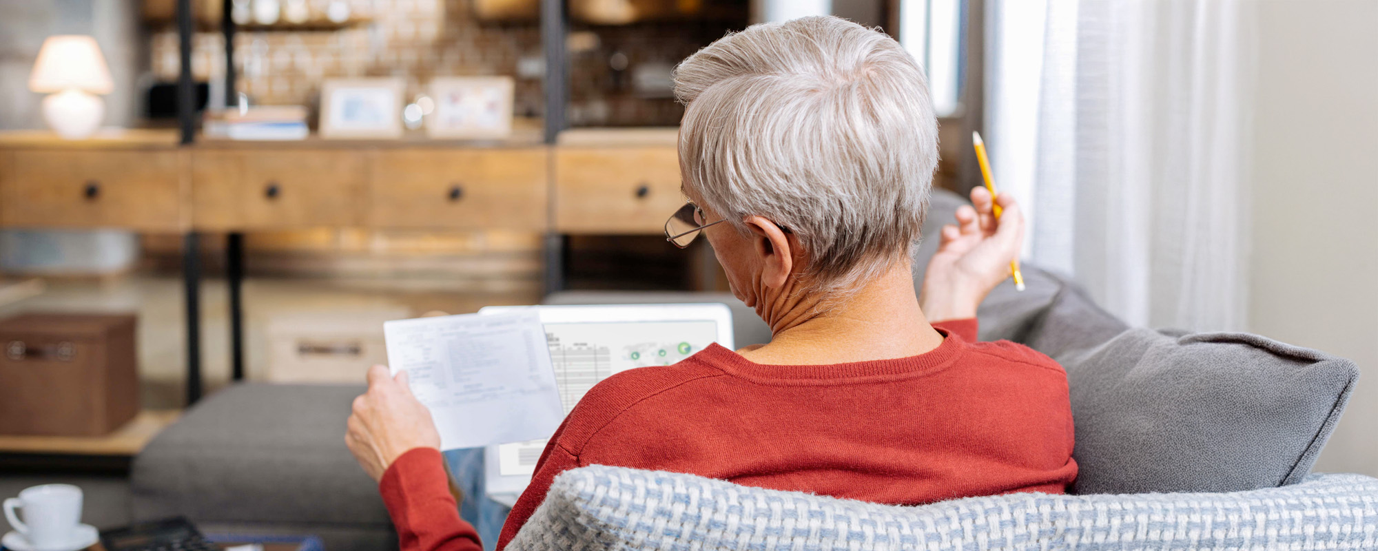 Serious intelligent man being involved in work