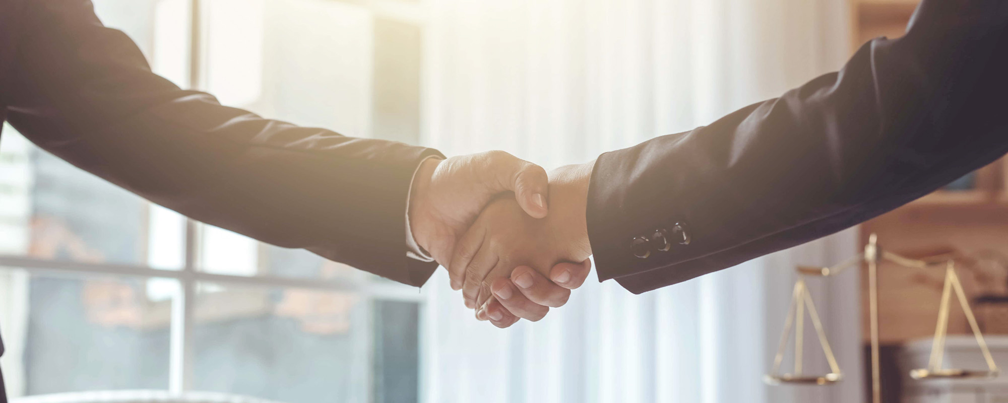 businessman and lawyer shaking hands 1
